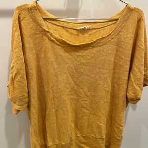 Eileen Fisher linen Top. Cuffed sleeves longer in back. Slightly boxy fit
